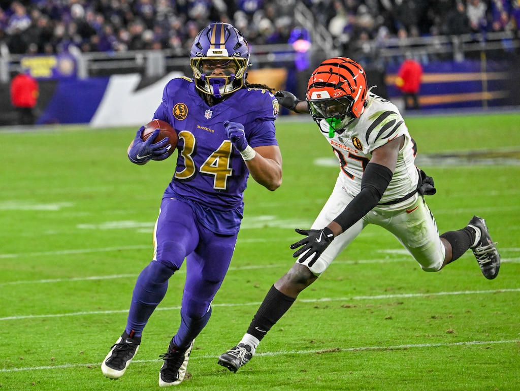 Thursday, Nov. 27, 2025 — Baltimore Ravens running back Keaton Mitchell (34) scores a touchdown in the 3rd quarter as the Ravens host the Cincinnati Bengals on Thanksgiving night at M&T Bank Stadium. The Bengals defeated the Baltimore Ravens 32 -14.