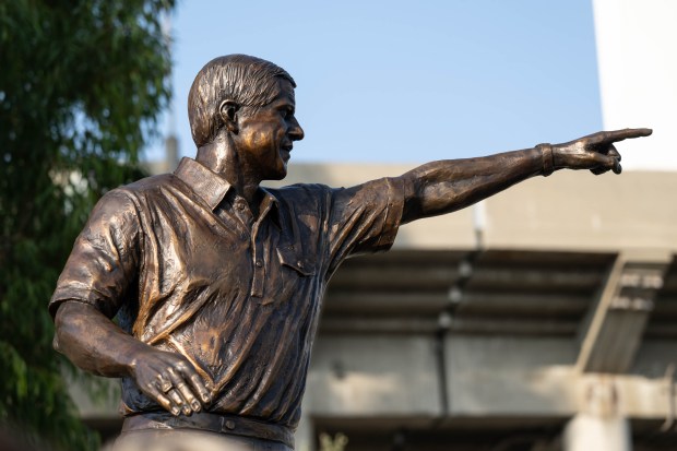 The new bronze statue in honor of UCLA coach Terry Donahue at the Rose Bowl Stadium on Friday, October 27th.The statue of Coach Donahue is surrounded by 151 bronze roses of varying shapes and sizes. As a gift by over 100 donors to the Rose Bowl Legacy Foundation, the non-profit that supports the preservation, protection and enhancement of the Stadium's future, each rose has been supported by an individual or family and honors one of the conference- and school-record 151 wins during Donahue's career on the UCLA sidelines. (Photo by David Crane, Los Angeles Daily News/SCNG)