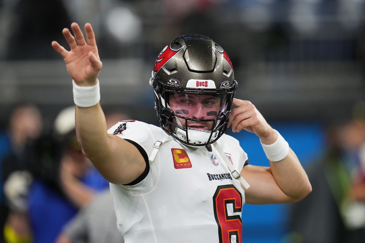 Tampa Bay Buccaneers quarterback Baker Mayfield (6) signals during warmups before an NFL football game