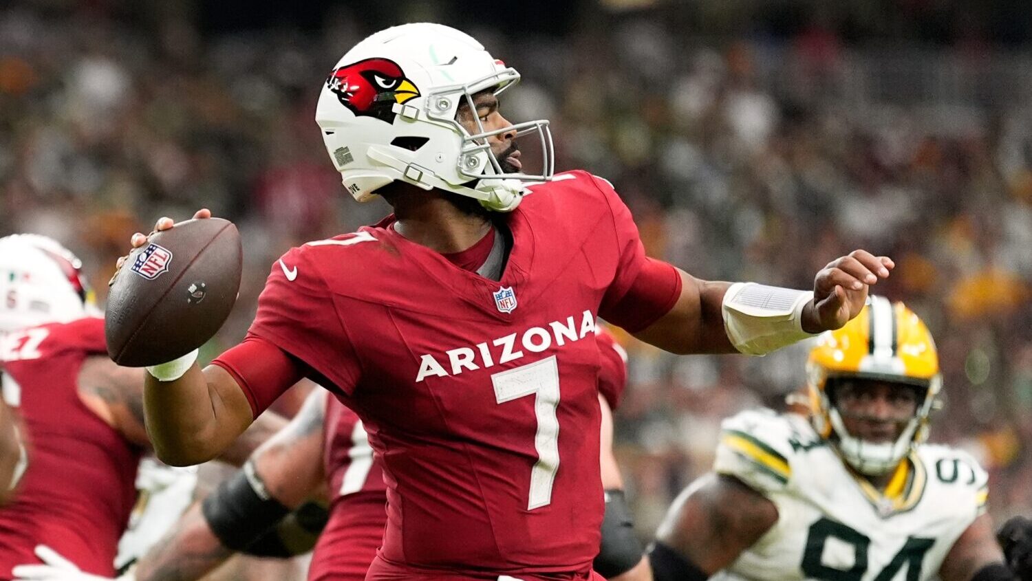 Arizona Cardinals' Jacoby Brissett throws during the first half of an NFL football game against the...