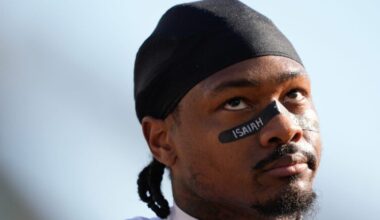 New England Patriots wide receiver Stefon Diggs walks on the field before an NFL football game against the Cincinnati Bengals, Sunday, Nov. 23, 2025, in Cincinnati.