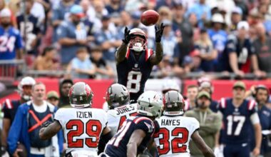 New England Patriots wide receiver Stefon Diggs (8) recovers an onside kick during the second half of an NFL football game against the Tampa Bay Buccaneers, Sunday, Nov. 9, 2025, in Tampa, Fla.
