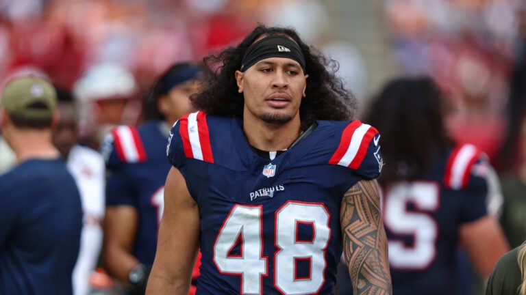 New England Patriots linebacker Jahlani Tavai (48) walks the sideline during an NFL football game against the Tampa Bay Buccaneers, Sunday, Nov. 9, 2025, in Tampa, Fla. Patriots defeated the Buccaneers 28-23.
