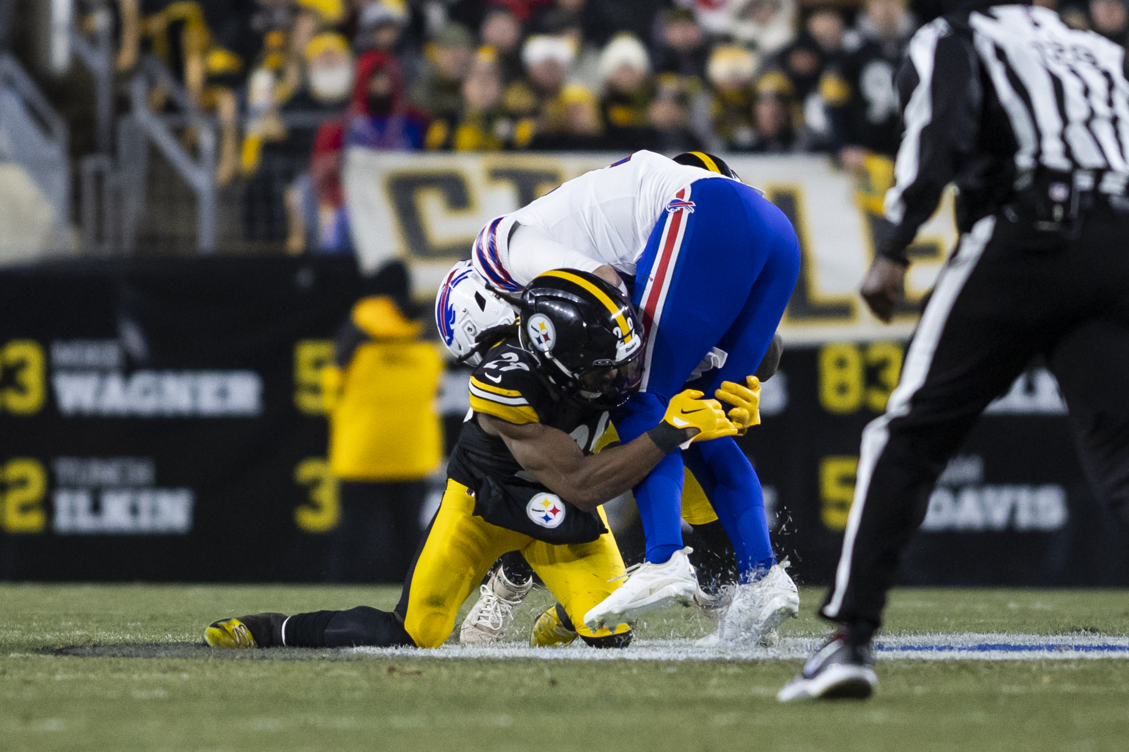 Pittsburgh Steelers safety Kyle Dugger (29) & Buffalo Bills quarterback Josh Allen (17) in-game. Pittsburgh Steelers vs. Buffalo BillsKylee Surike | Special to PennLive
