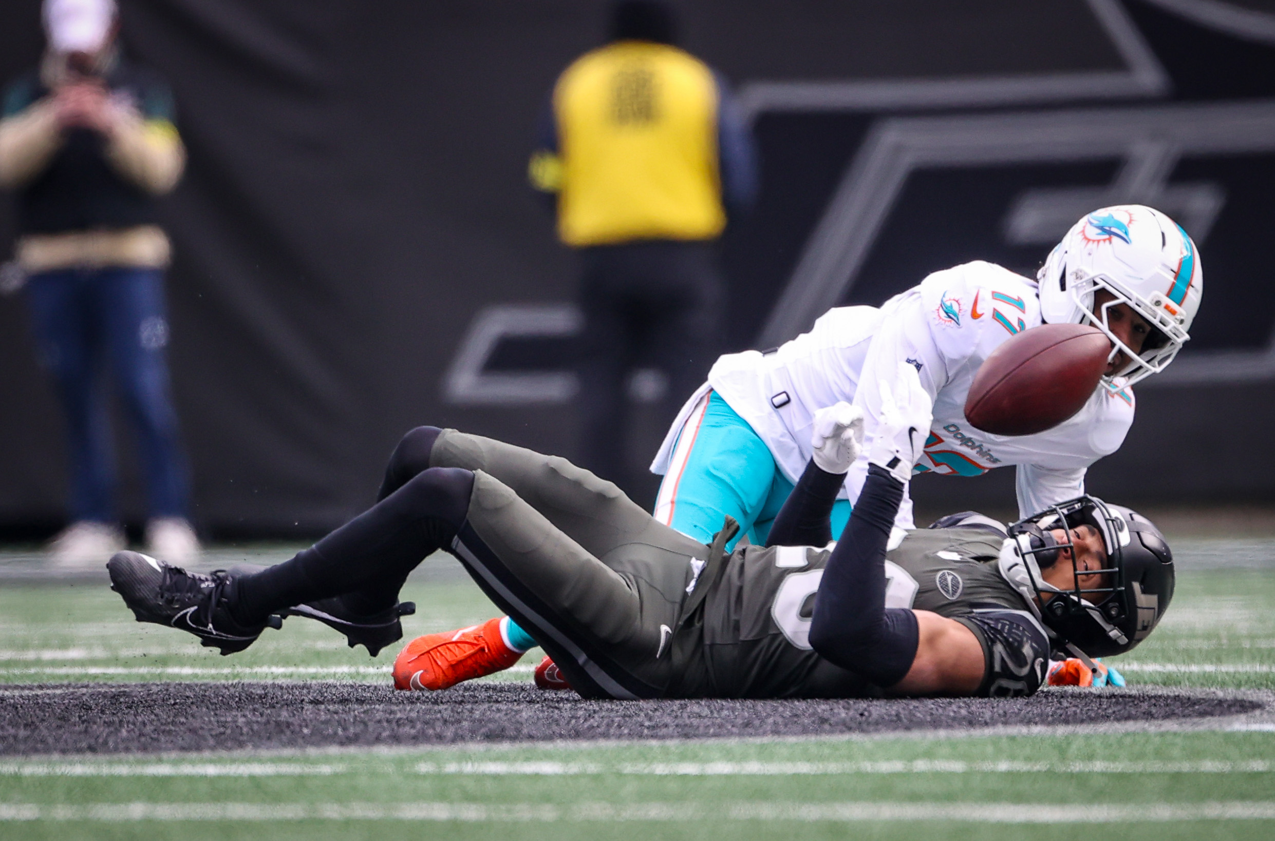 New York Jets safety Isaiah Oliver (26) breaks up a pass intended for Miami Dolphins wide receiver Jaylen Waddle (17) during the second quarter, Sunday, Dec. 7, 2025 at MetLife Stadium in East Rutherford, N.J.