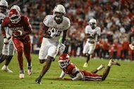 Texas A&M running back EJ Smith (22) runs for a big gain against Arkansas during an NCAA...
