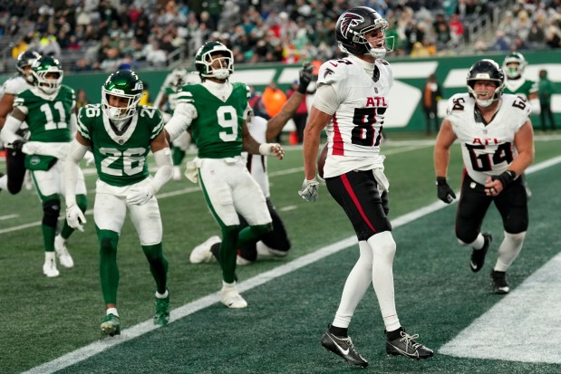 Atlanta Falcons wide receiver David Sills V (87) celebrates hios touchdown against the New York Jets during the second half of an NFL football game, Sunday, Nov. 30, 2025, in East Rutherford, N.J. (AP Photo/Seth Wenig)