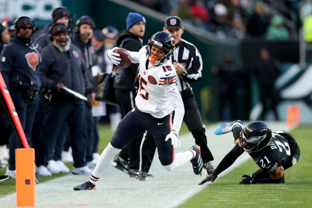 PHILADELPHIA, PENNSYLVANIA - NOVEMBER 28: Rome Odunze #15 of the Chicago Bears runs out of bounds after a catch against Sydney Brown #21 of the Philadelphia Eagles during the second quarter in the game at Lincoln Financial Field on November 28, 2025 in Philadelphia, Pennsylvania. (Photo by Emilee Chinn/Getty Images)