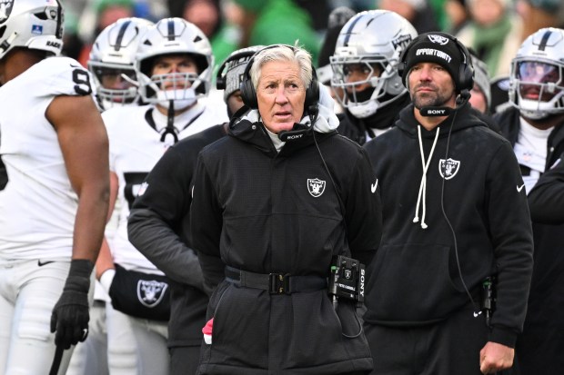 Las Vegas Raiders head coach Pete Carroll looks on from the sideline during the second half of an NFL football game against the Philadelphia Eagles, Sunday, Dec. 14, 2025, in Philadelphia.. (AP Photo/Terrance Williams)