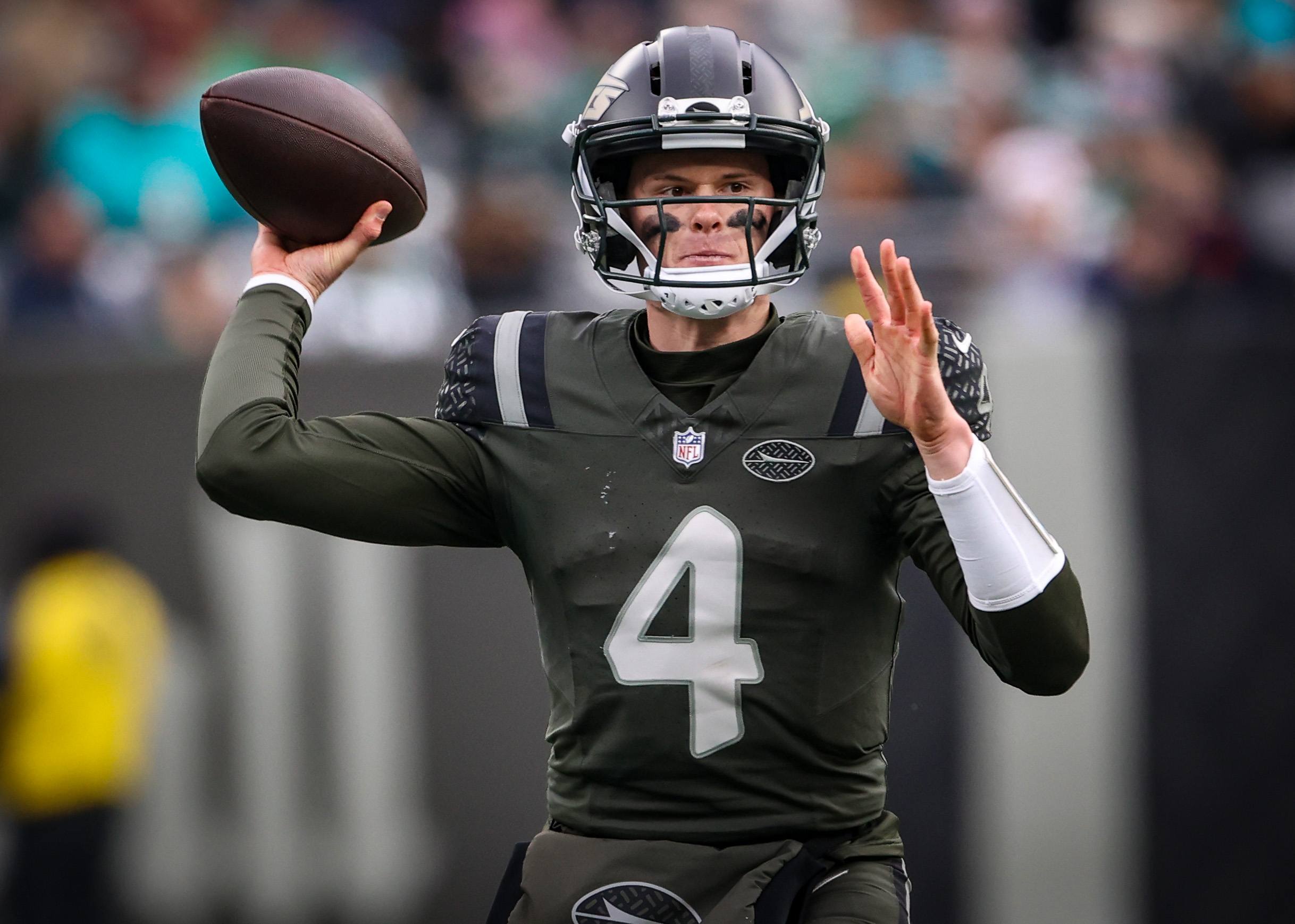 New York Jets rookie quarterback Brady Cook (4) throws a. Pass during the second quarter against the Miami Dolphins, Sunday, Dec. 7, 2025 at MetLife Stadium in East Rutherford, N.J. Cook came into the game after starter Tyrod Taylor was injured in the first quarter.