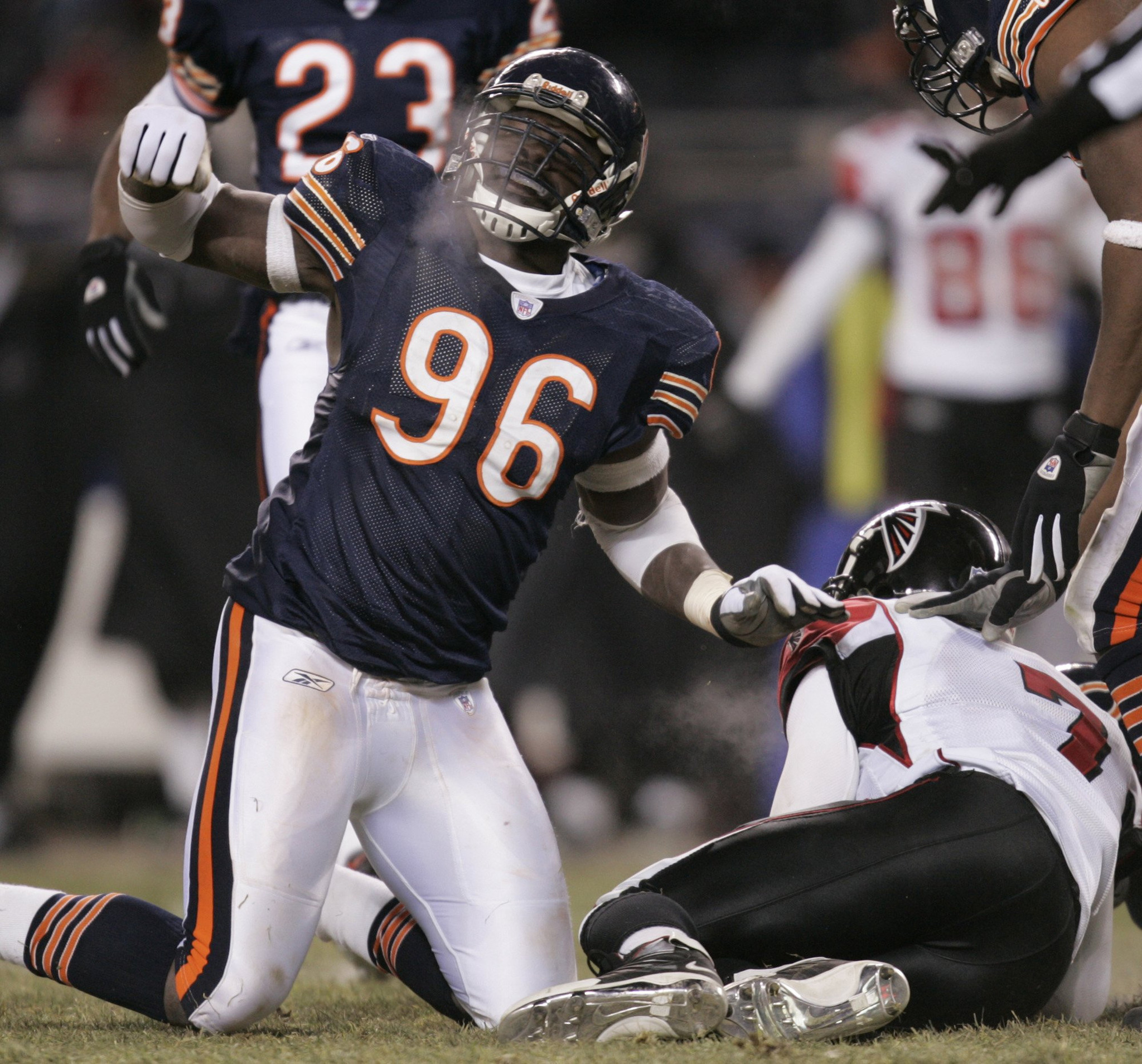 Chicago Bears' Alex Brown enjoys the moment after the Atlanta Falcons Michael Vick was sacked by his teammate Tank Johnson during their game at Soldier Field on Dec. 18, 2005.