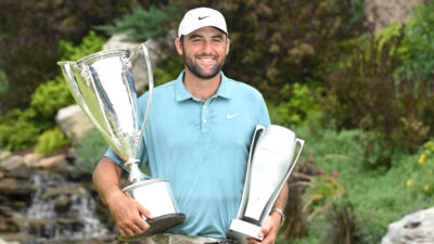 Aug 17, 2025; Owings Mills, Maryland, USA; Scottie Scheffler poses with the J. K. Wadley Trophy and The Keeper after winning the BMW Championship golf tournament.