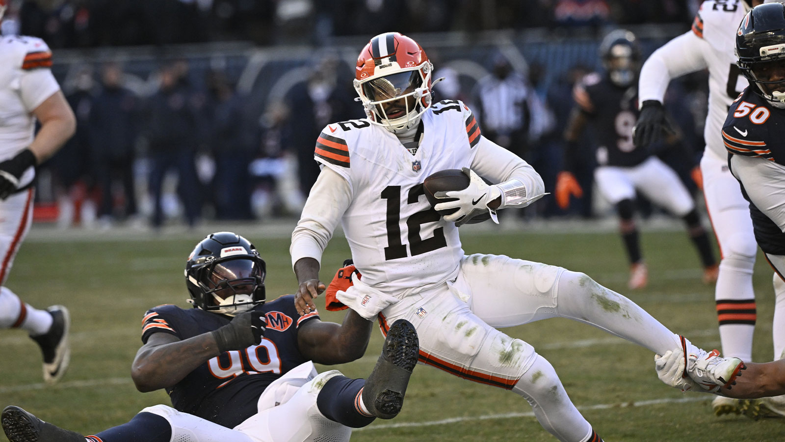 Chicago Bears defensive tackle Gervon Dexter Sr. (99) sacks Cleveland Browns quarterback Shedeur Sanders (12) during the fourth quarter at Soldier Field.