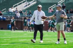 Ohio defensive coordinator John Hauser walking the field during the Spring Game.