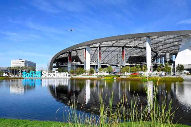The morning after Super Bowl LVI the SoFi Stadium is quiet with only a few fans milling about and clean up crews working on dismantling the set up in Inglewood on Monday, February 14, 2022. (Photo by Brittany Murray, Press-Telegram/SCNG)