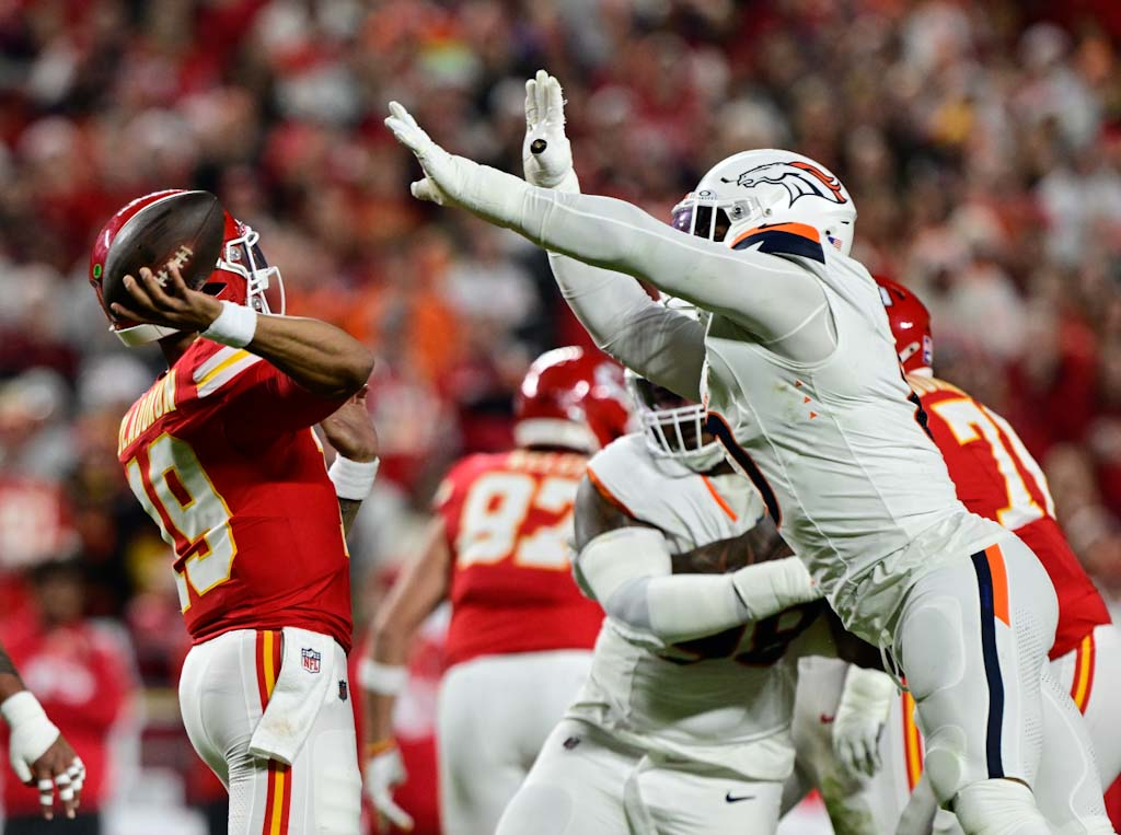 Denver Broncos outside linebacker Jonathon Cooper (0) pressures Kansas City...