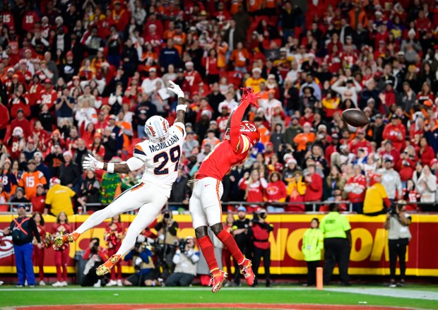 Kansas City Chiefs wide receiver Marquise Brown (5) can't get ahold of a pass in the end zone against Denver Broncos cornerback Ja'Quan McMillian (29) on a 4th and 8 to end the game at GEHA Field at Arrowhead Stadium in Kansas City, Missouri on Thursday, Dec. 25, 2025. Denver won 20-13. (Photo by Andy Cross/The Denver Post)