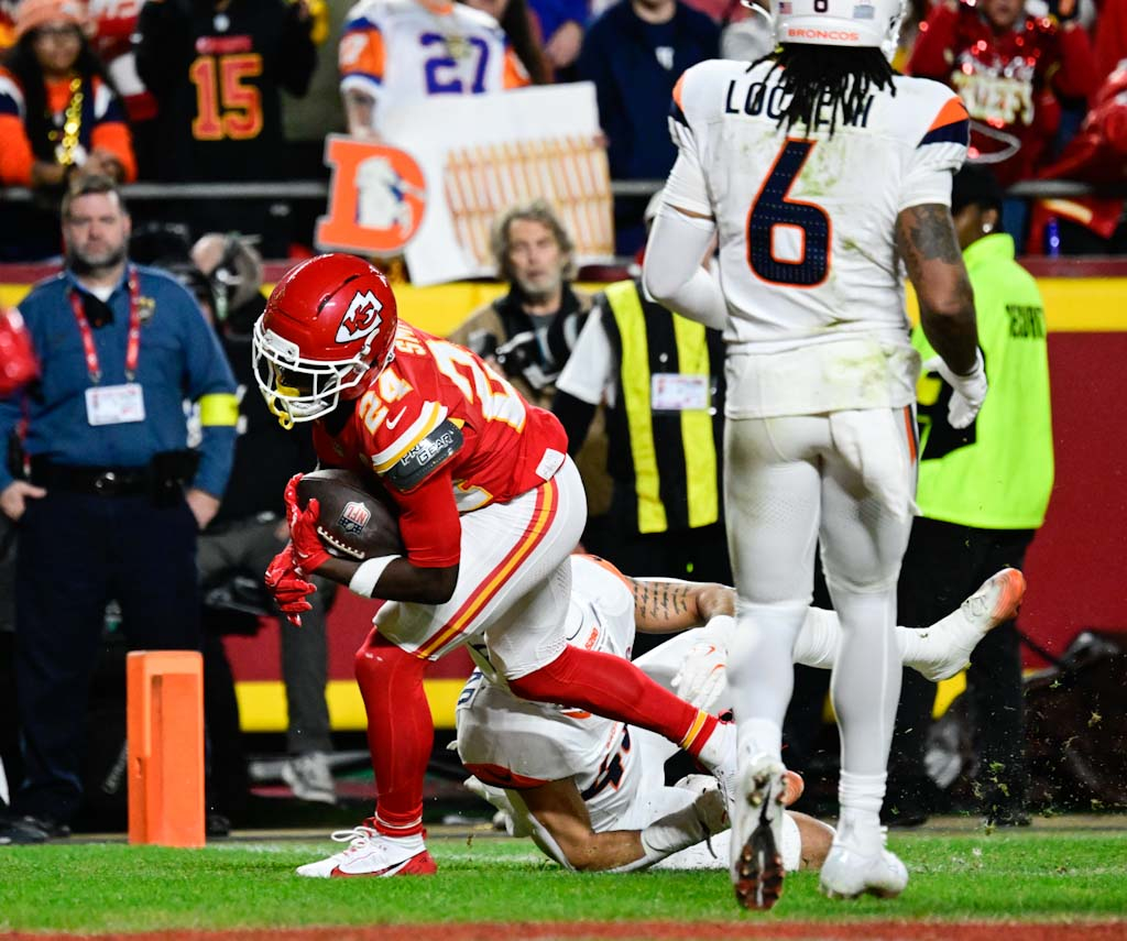 Kansas City Chiefs running back Brashard Smith (24) scores a...