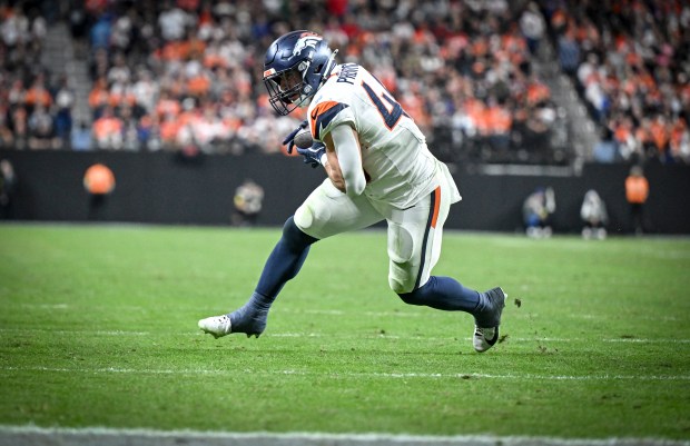 Adam Prentice (46) of the Denver Broncos after catching a pass from Bo Nix (10) during the fourth quarter against the Las Vegas Raiders at Allegiant Stadium in Las Vegas, Nevada on Sunday, Dec. 7, 2025. (Photo by AAron Ontiveroz/The Denver Post)
