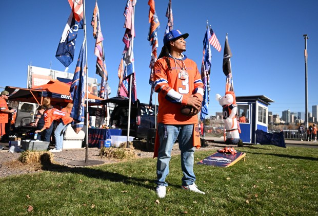 Andrew Young, The Mad Fanatic, a rapper who makes songs about the Broncos stands for a portrait outside a tailgate party put on by a group that he founded called the Bronco Gang at Empower Field at Mile High on Nov. 16, 2025. (Photo by RJ Sangosti/The Denver Post)