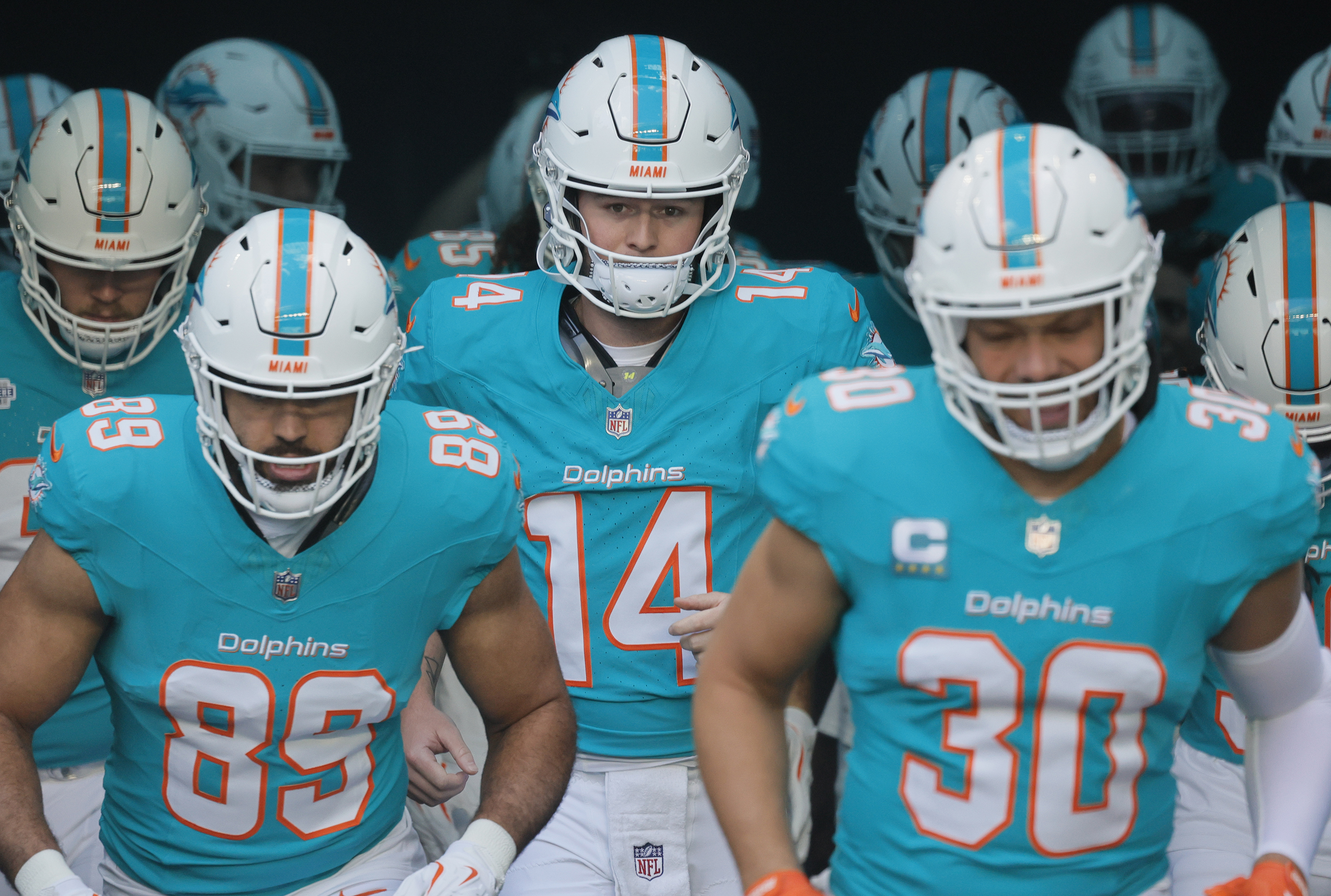 Miami Dolphins quarterback Quinn Ewers (14) prepares to take the...