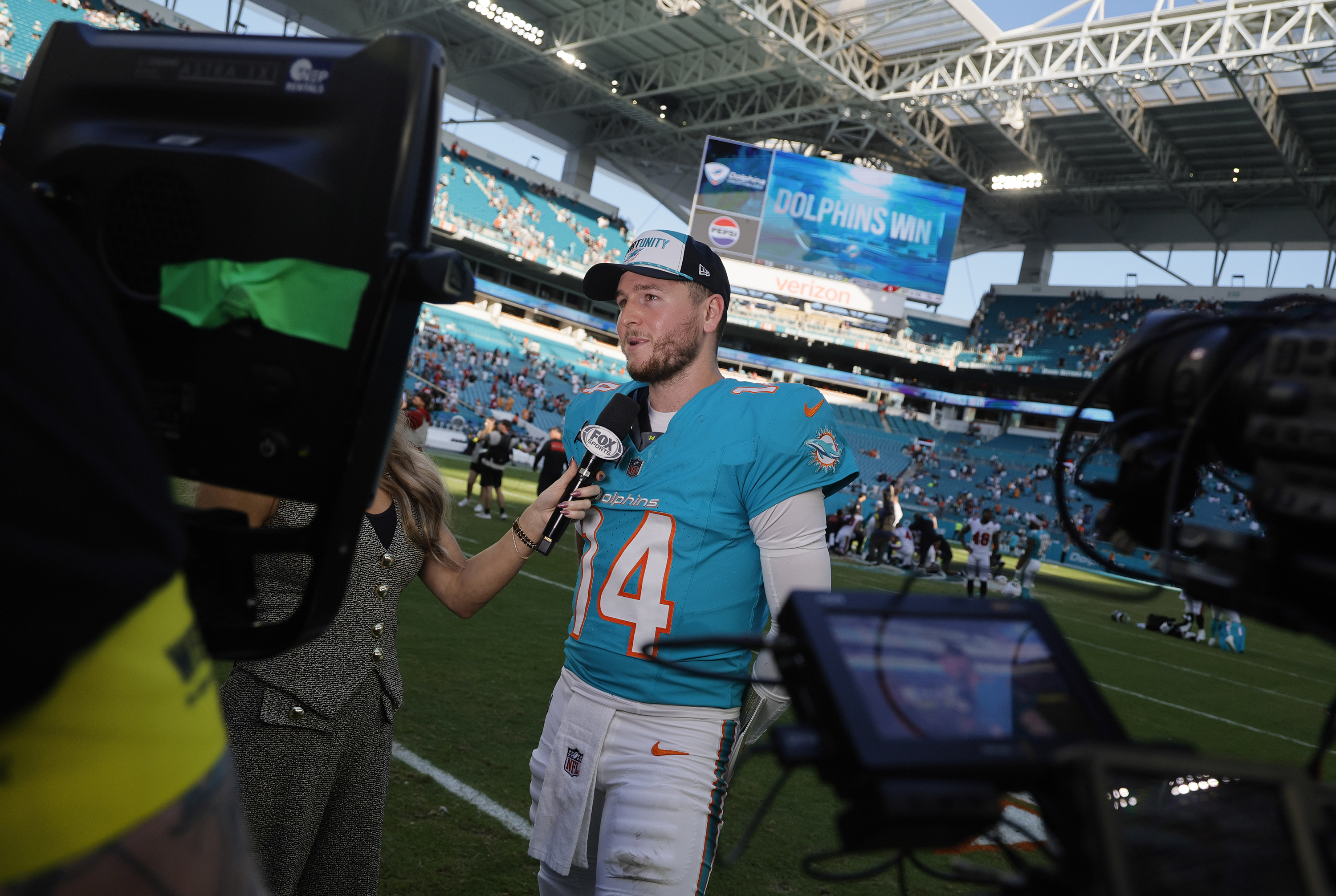 Dolphins quarterback Quinn Ewers speaks to the media after Miami's...