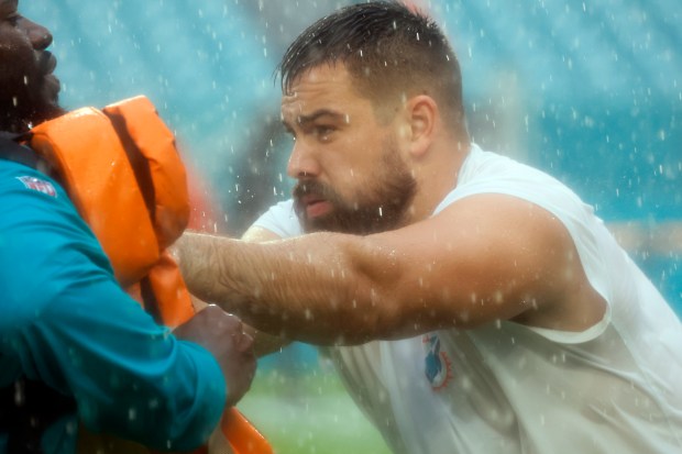 Miami Dolphins defensive tackle Zach Sieler (92) works out in...