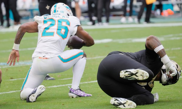 Miami Dolphins cornerback Rasul Douglas (26) intercepts a pass against...