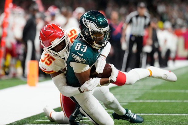 Philadelphia Eagles wide receiver Jahan Dotson, after making a key catch, is tackled just short of the goal line by Kansas City Chiefs cornerback Jaylen Watson during the first half of Super Bowl 59 on Sunday, Feb. 9, 2025, in New Orleans. The two teams will play Sept. 14 in a Super Bowl rematch. (Ashley Landis/AP)