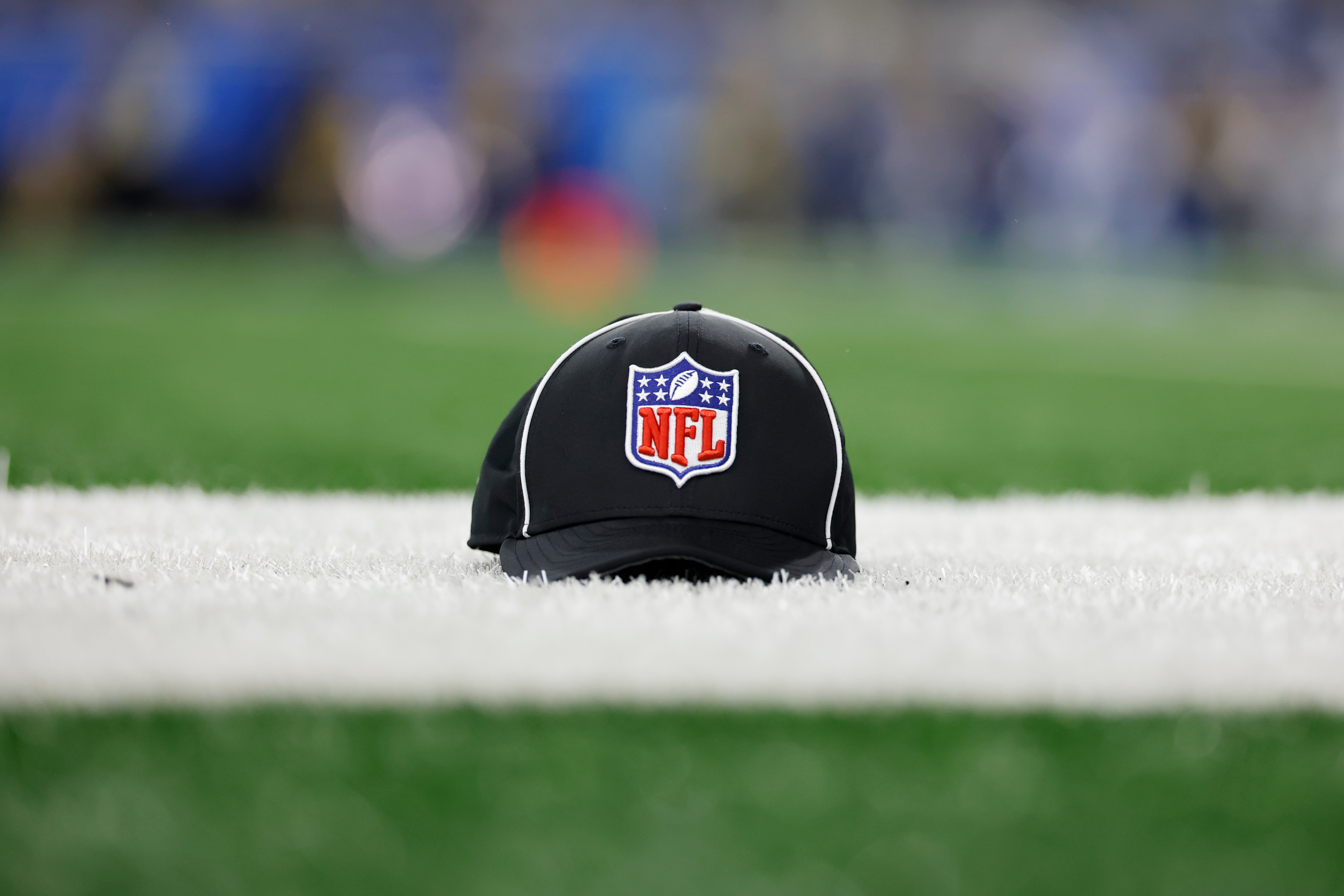 An NFL official’s hat is seen during the first half...