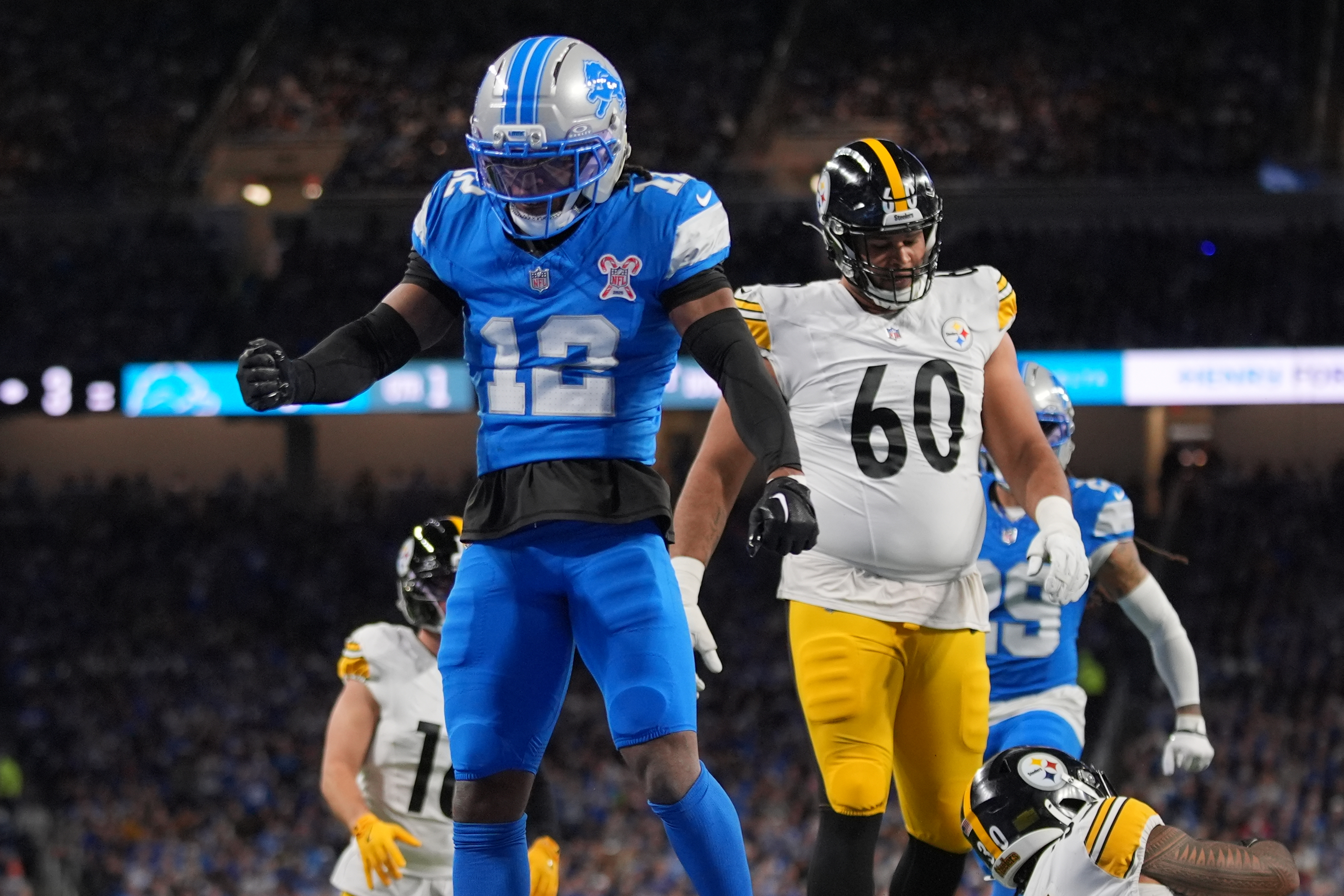 Detroit Lions’ Thomas Harper reacts after a tackle during the...