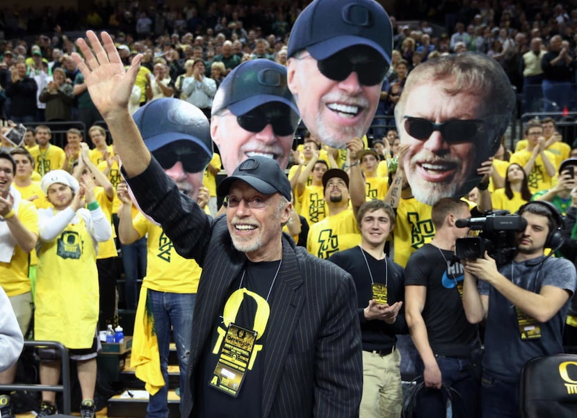 FILE- In this Feb. 1, 2014, file photo, Nike's Phil Knight acknowledges the crowd on Uncle...