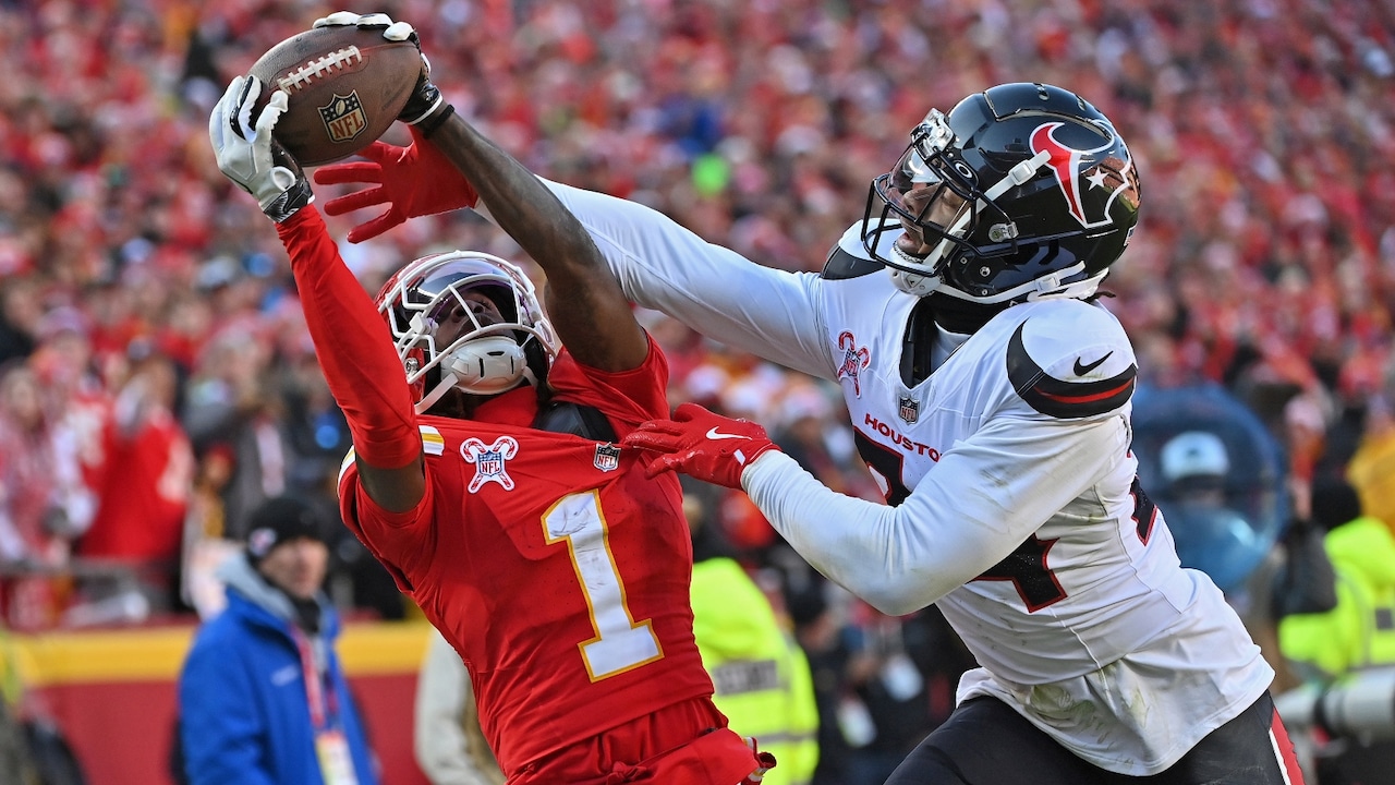 Kansas City Chiefs wide receiver Xavier Worthy (1) reaches up for the ball against Houston Texans cornerback Derek Stingley Jr. (24) during an NFL football game Saturday, Dec. 21, 2024, in Kansas City, Mo.