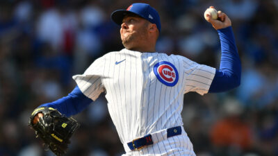 Sep 13, 2025; Chicago, Illinois, USA; Chicago Cubs pitcher Caleb Thielbar (24) pitches against the Tampa Bay Rays during a game at Wrigley Field. Mandatory Credit: Patrick Gorski-Imagn Images