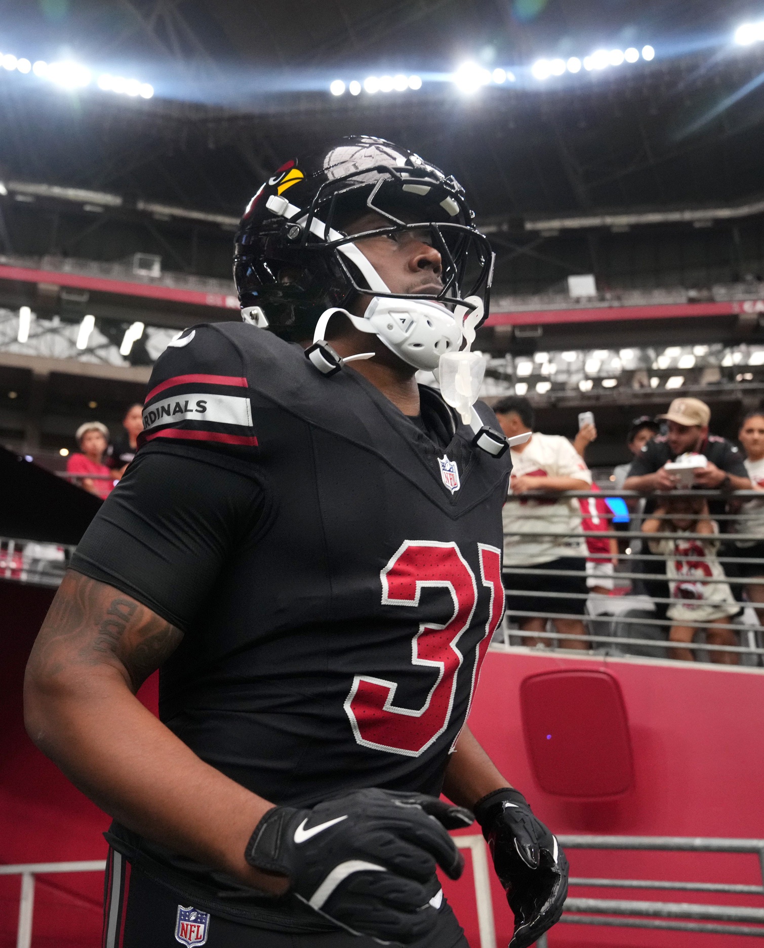 Arizona Cardinals running back Emari Demercado (31) takes the field before their game against the Tennessee Titans at State Farm Stadium in Glendale on Oct. 5, 2025. © Joe Rondone/The Republic / USA TODAY NETWORK via Imagn Images