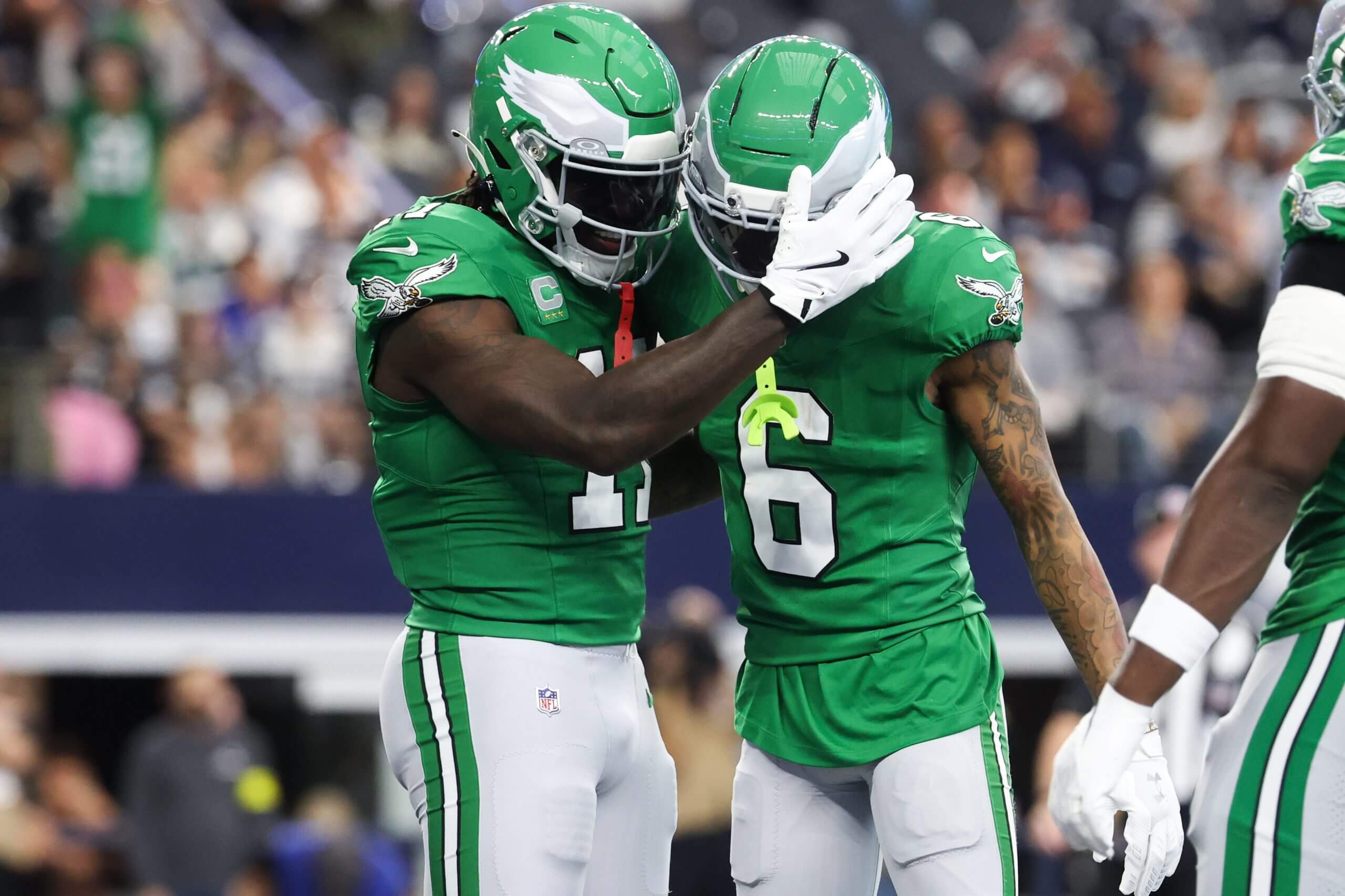 Eagles receivers A.J. Brown and DeVonta Smith celebrate a touchdown during a game against the Dallas Cowboys.