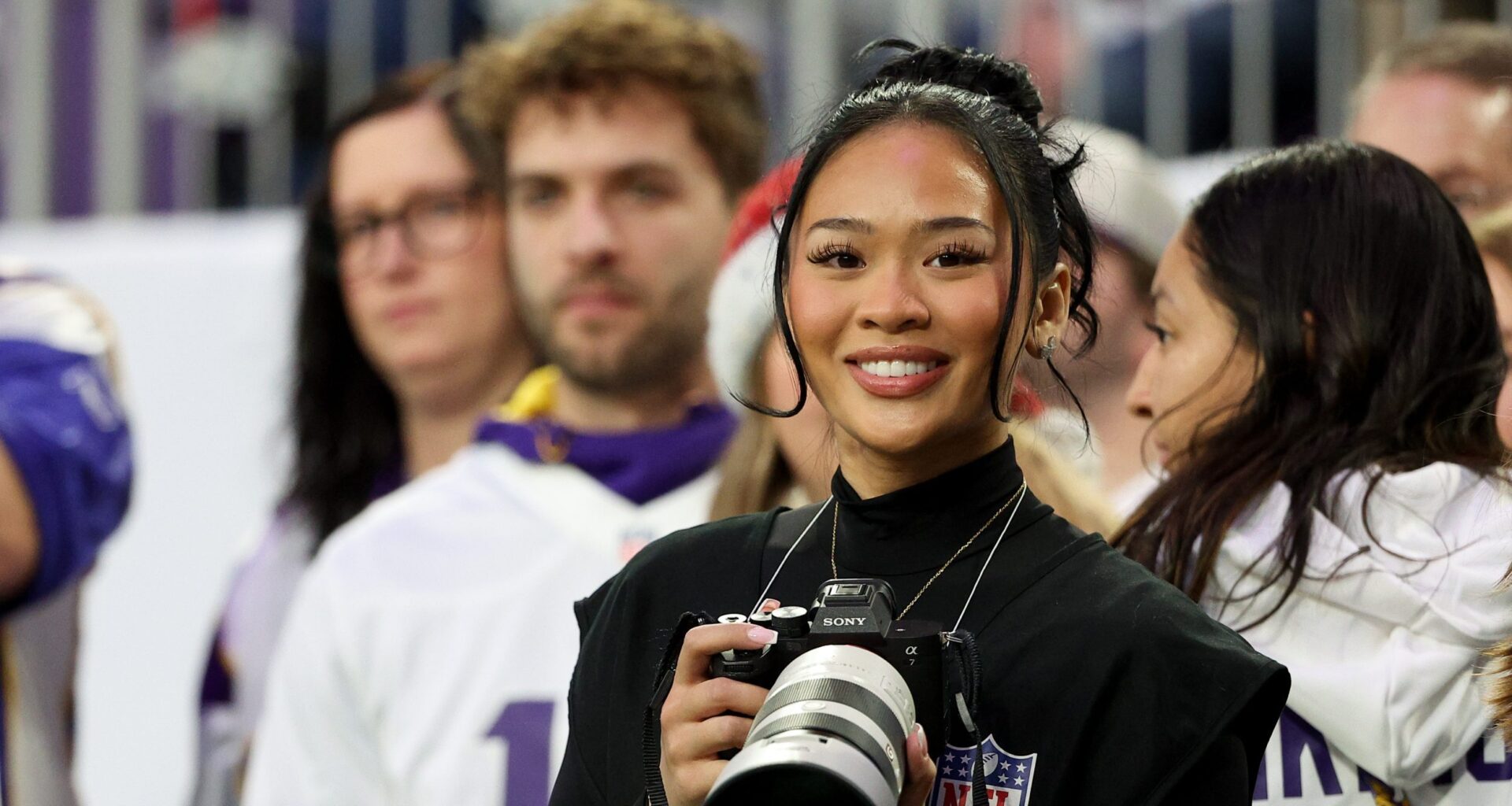 Suni Lee works as photographer for Vikings' Christmas Day game