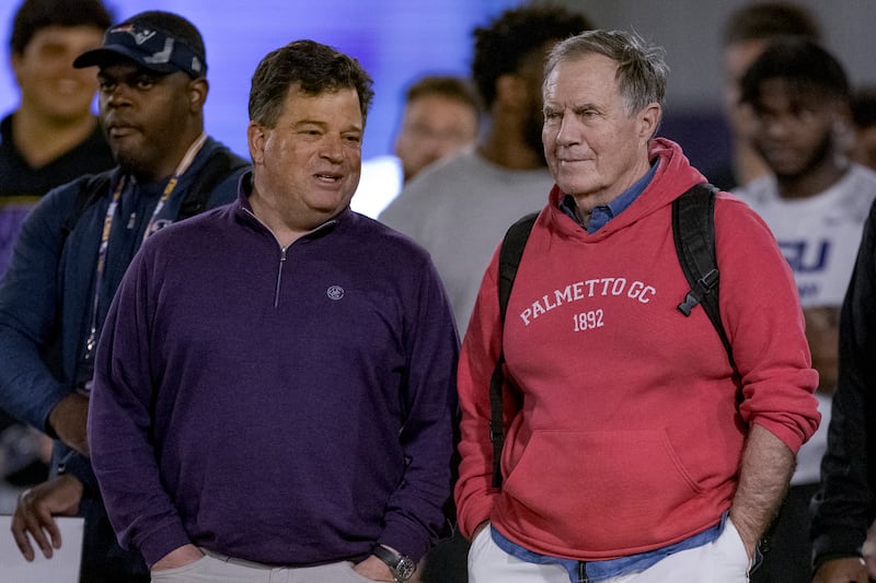 New England Patriots head coach Bill Belichick, right, talks with Scott Woodward, LSU athletic director, during LSU Pro Day on Wednesday, March 29, 2023, in Baton Rouge, La.