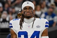 Dallas Cowboys cornerback Shavon Revel Jr. looks on during the national anthem before an NFL...