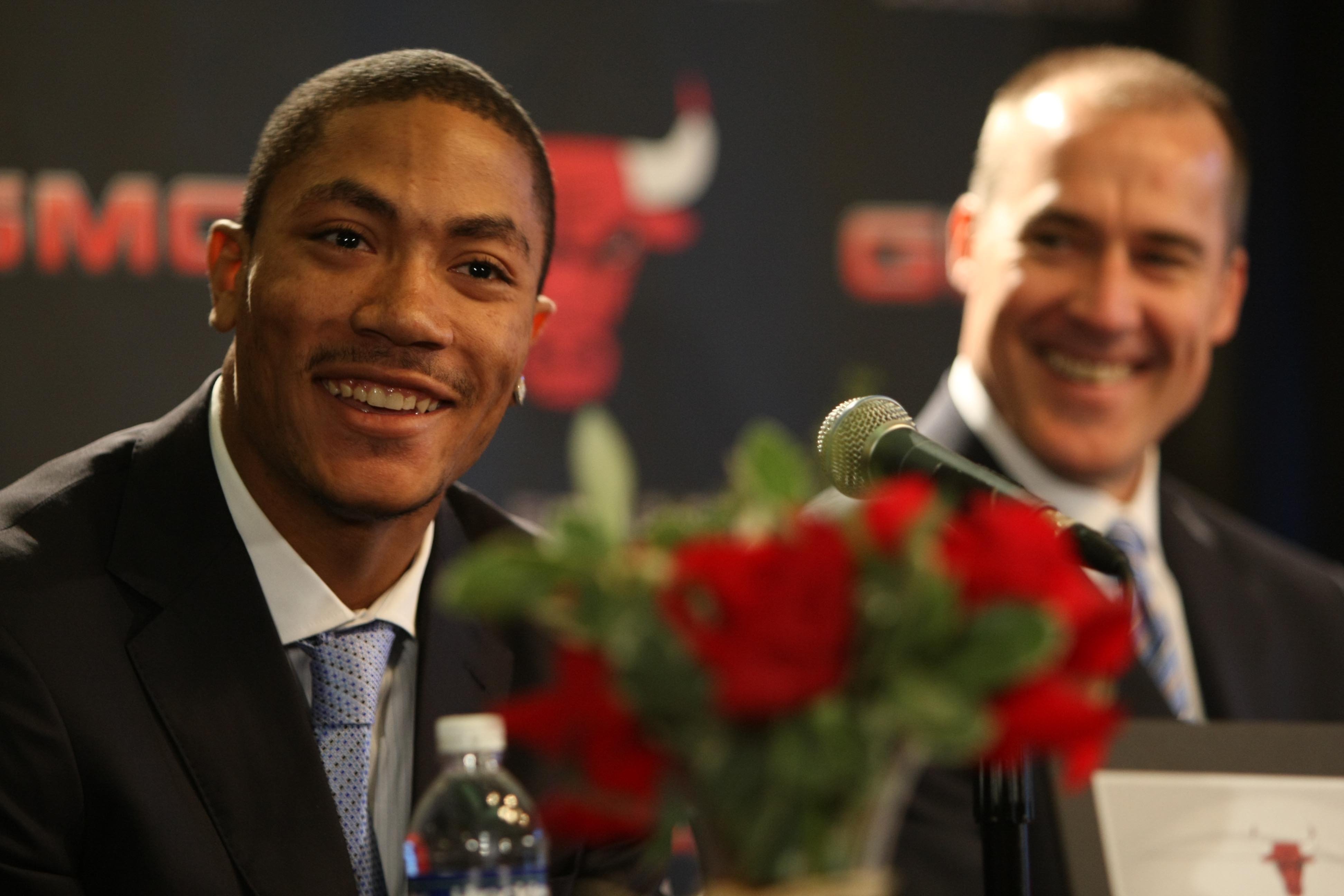 Bulls top pick Derrick Rose meets with reporters along with general manager John Paxson on June 30, 2008, at the United Center.