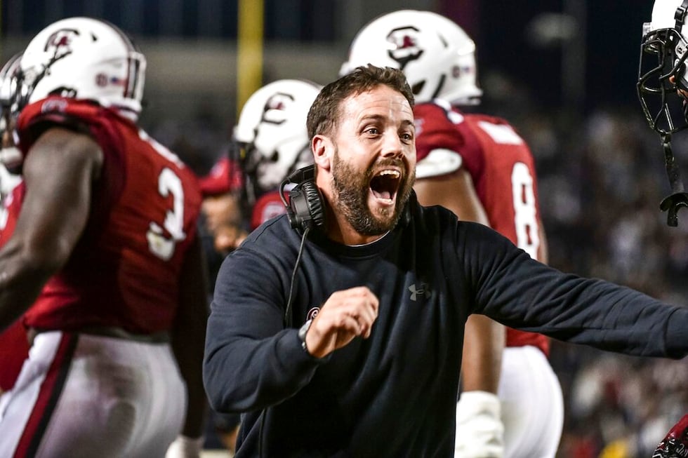 South Carolina assistant coach Coleman Hutzler celebrates a turnover during the second half of...