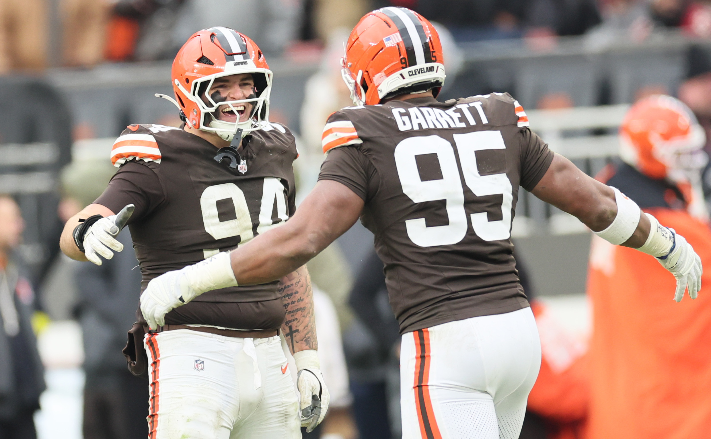 Cleveland Browns defensive tackle Mason Graham (L) congratulates Cleveland Browns defensive end Myles Garrett after his sack on San Francisco 49ers quarterback Brock Purdy in the second half at Huntington Bank Field.