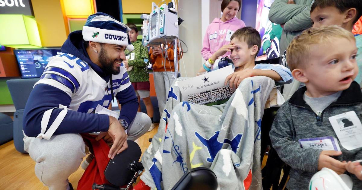 See photos as Dallas Cowboys pay visit to Children's Medical Center in Dallas