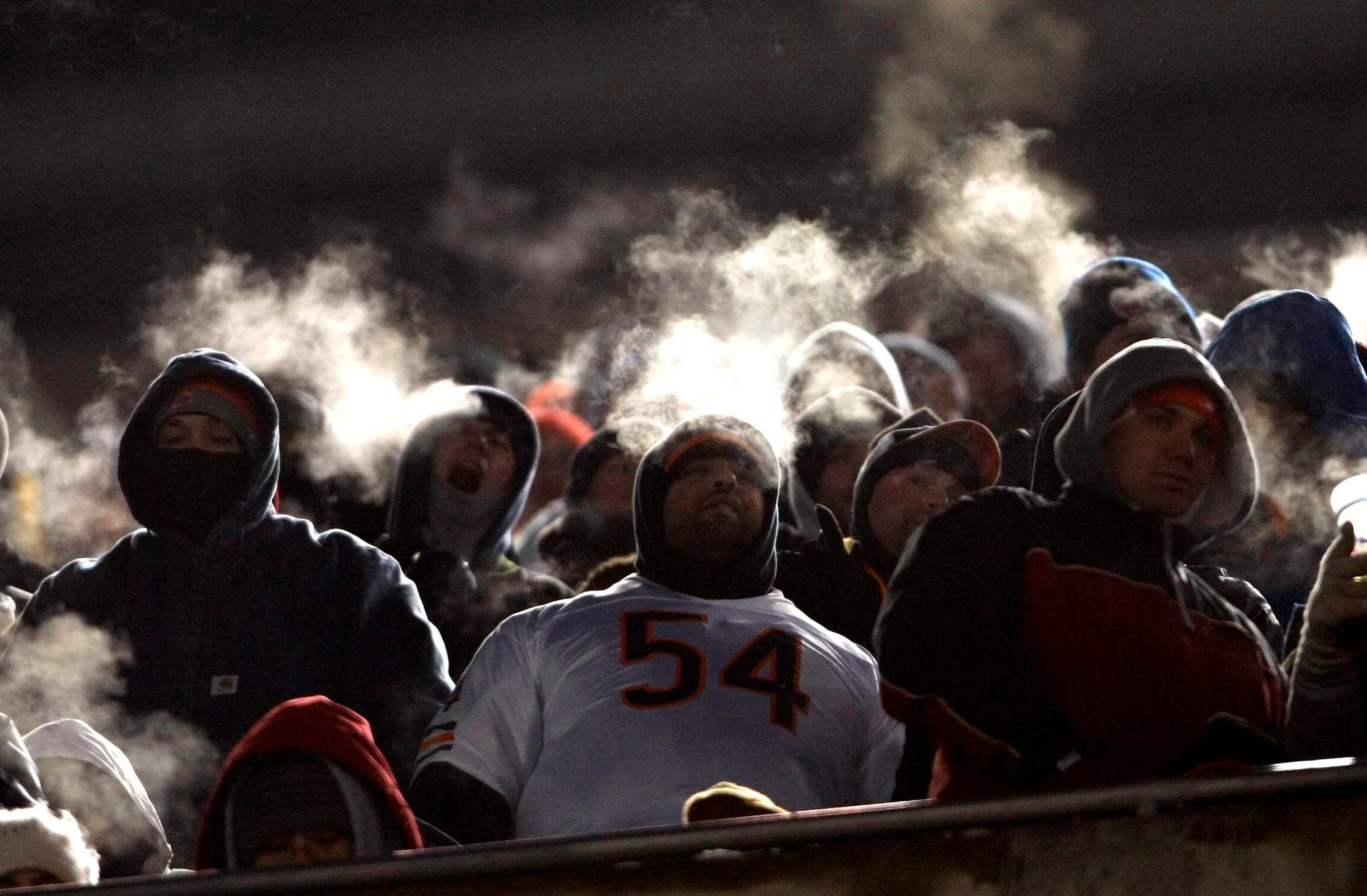 Fans watch in the cold as the Bears play the Green Bay Packers on Dec. 22, 2008.