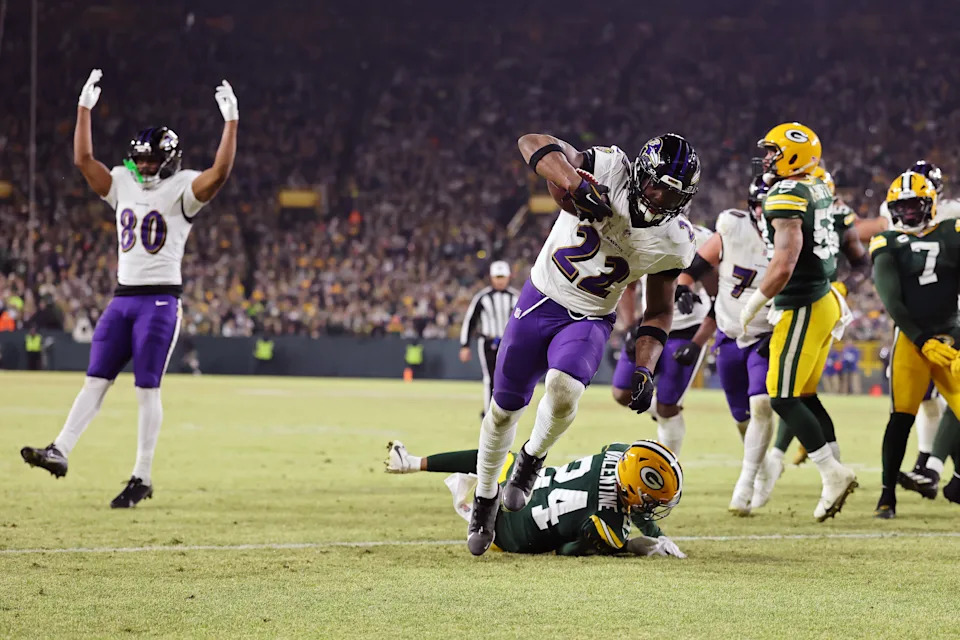GREEN BAY, WISCONSIN - DECEMBER 27: Derrick Henry #22 of the Baltimore Ravens scores a touchdown in the second quarter against the Green Bay Packers at Lambeau Field on December 27, 2025 in Green Bay, Wisconsin. (Photo by Michael Reaves/Getty Images)