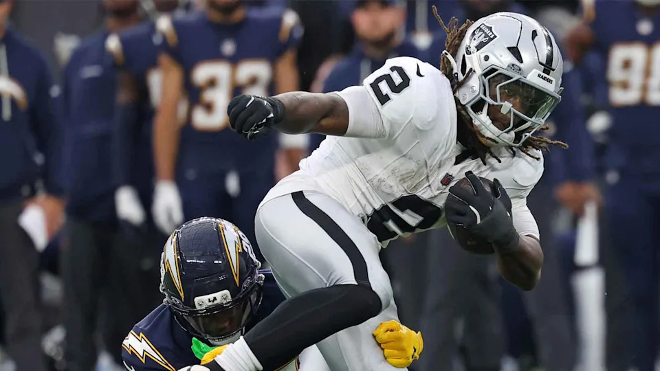 Nov 30, 2025; Inglewood, California, USA; Las Vegas Raiders running back <a href="https://clutchpoints.com/tag/ashton-jeanty" rel="nofollow noopener" target="_blank" data-ylk="slk:Ashton Jeanty;elm:context_link;itc:0;sec:content-canvas" class="link ">Ashton Jeanty</a> (2) rushes the ball past Los Angeles Chargers cornerback Tarheeb Still (29) during the second half at SoFi Stadium. Mandatory Credit: Kiyoshi Mio-Imagn Images