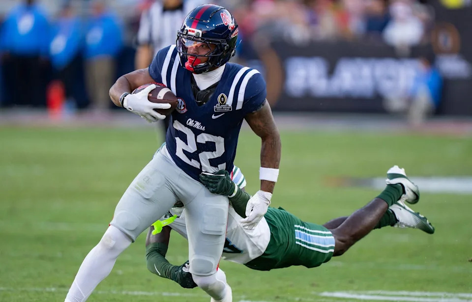 Ole Miss running back Logan Diggs (22) runs the ball during the first round of the College Football Playoff against Tulane at Vaught-Hemingway Stadium in Oxford, Miss., on Saturday, Dec. 20, 2025.