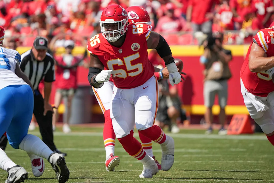 Aug 17, 2024; Kansas City, Missouri, USA; Kansas City Chiefs guard Trey Smith (65) prepares to block against the Detroit Lions during the game at GEHA Field at Arrowhead Stadium. Mandatory Credit: Denny Medley-USA TODAY Sports