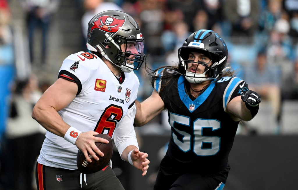 Carolina Panthers linebacker Christian Rozeboom (56) sacks Tampa Bay Buccaneers quarterback Baker Mayfield (6).
