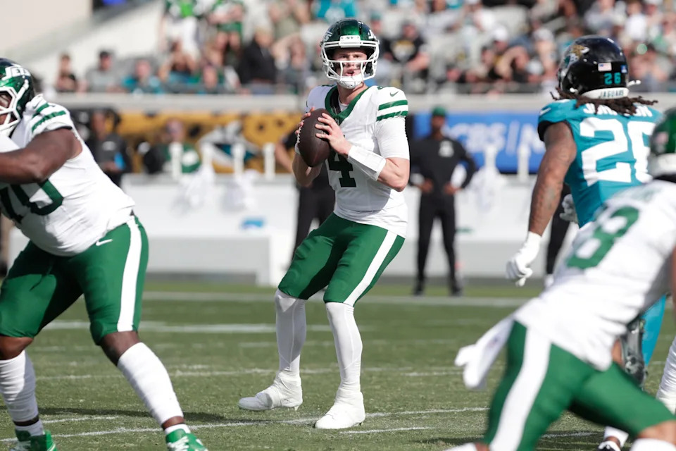 Dec 14, 2025; Jacksonville, Florida, USA; New York Jets quarterback Brady Cook (4) during the second quarter against the Jacksonville Jaguars at EverBank Stadium. Mandatory Credit: Travis Register-Imagn Images